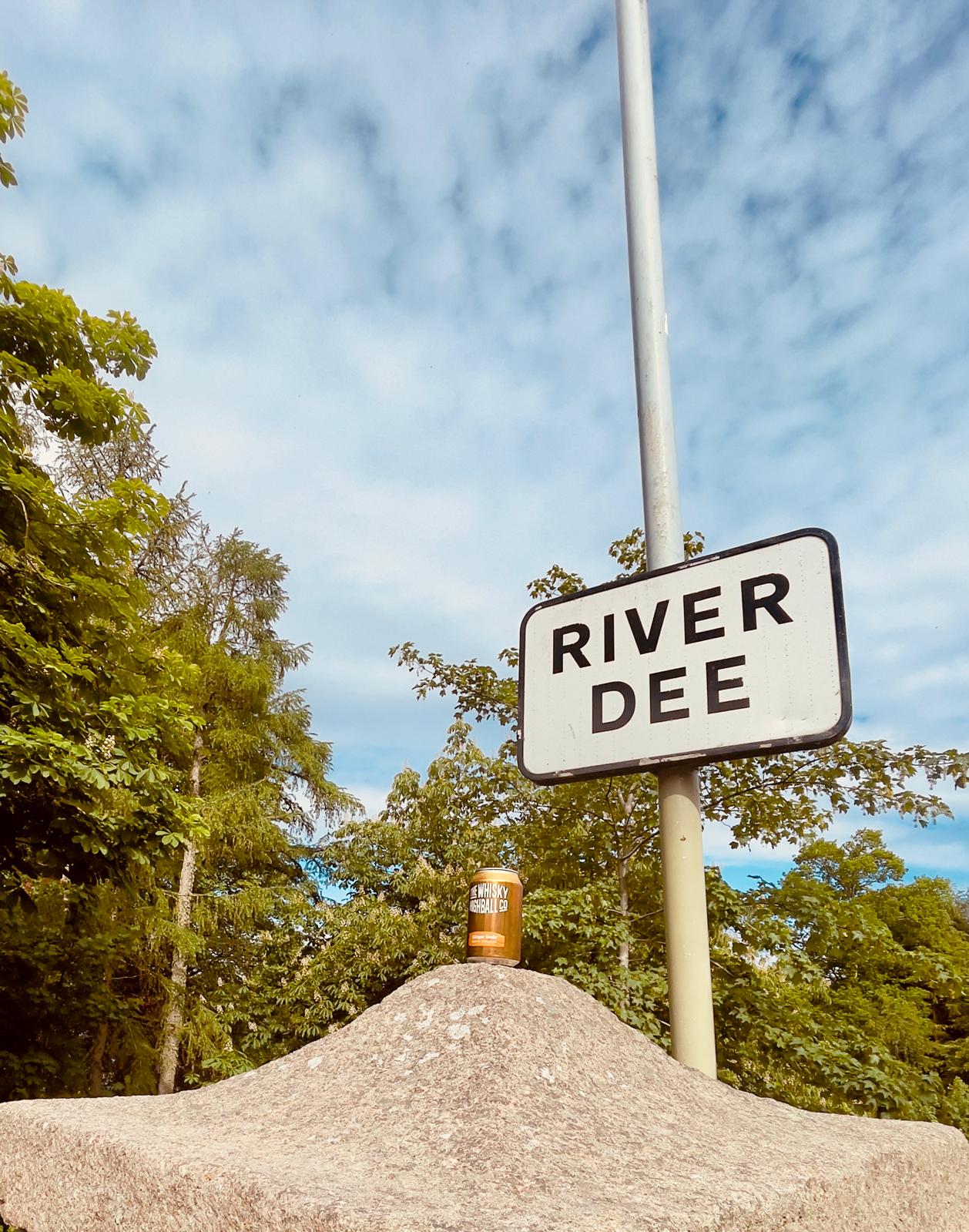 TWHC can at River Dee sign