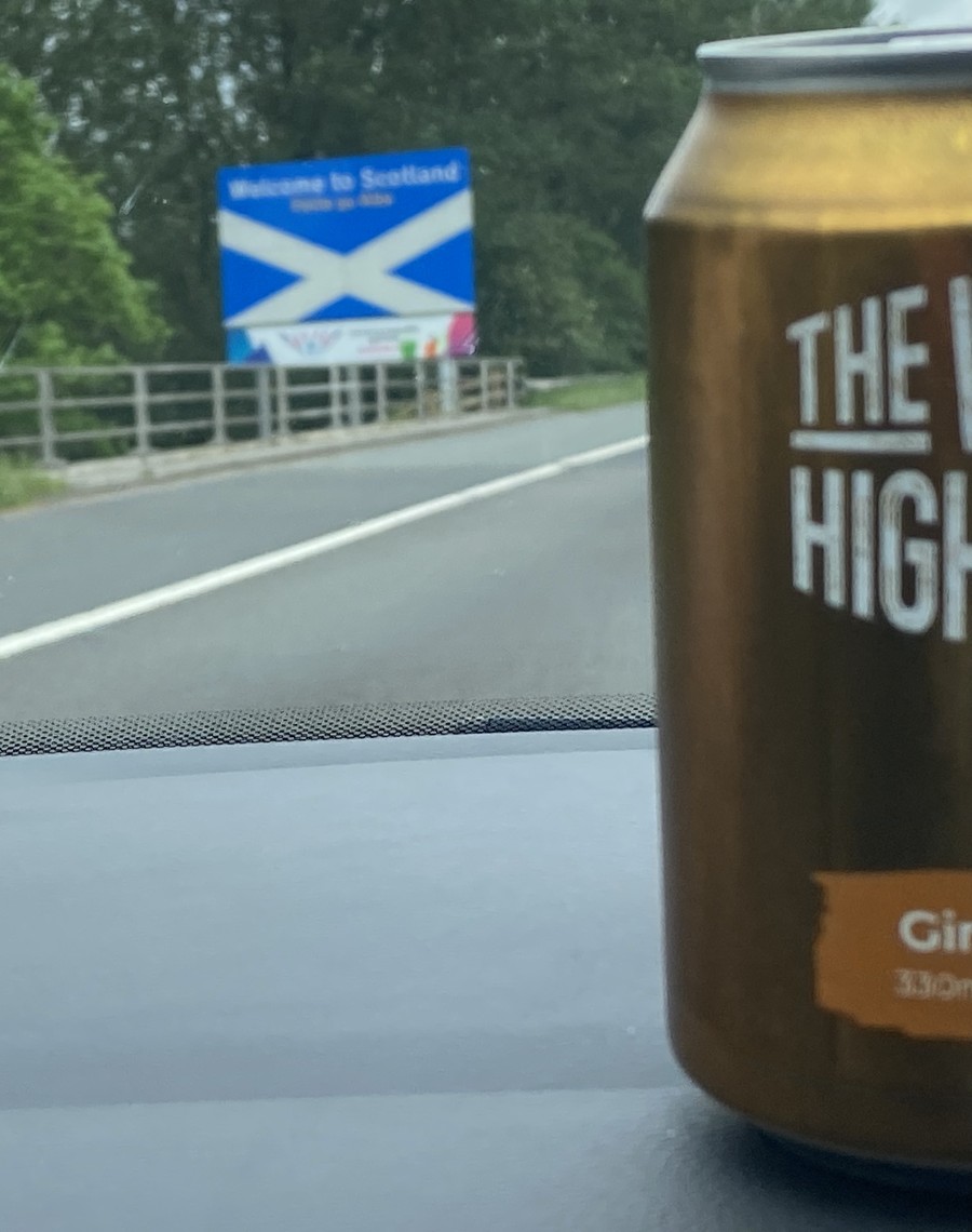 Can on the dashboard crossing back into Scotland