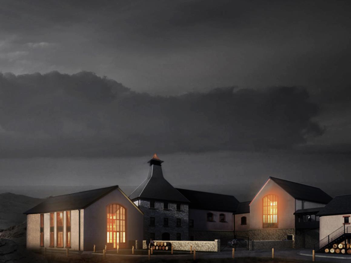 Dartmoor Distillery at night with the lights on